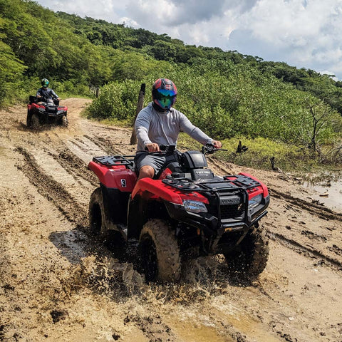 ATV riders exploring the coastline of Tierra Bomba Island near Cartagena